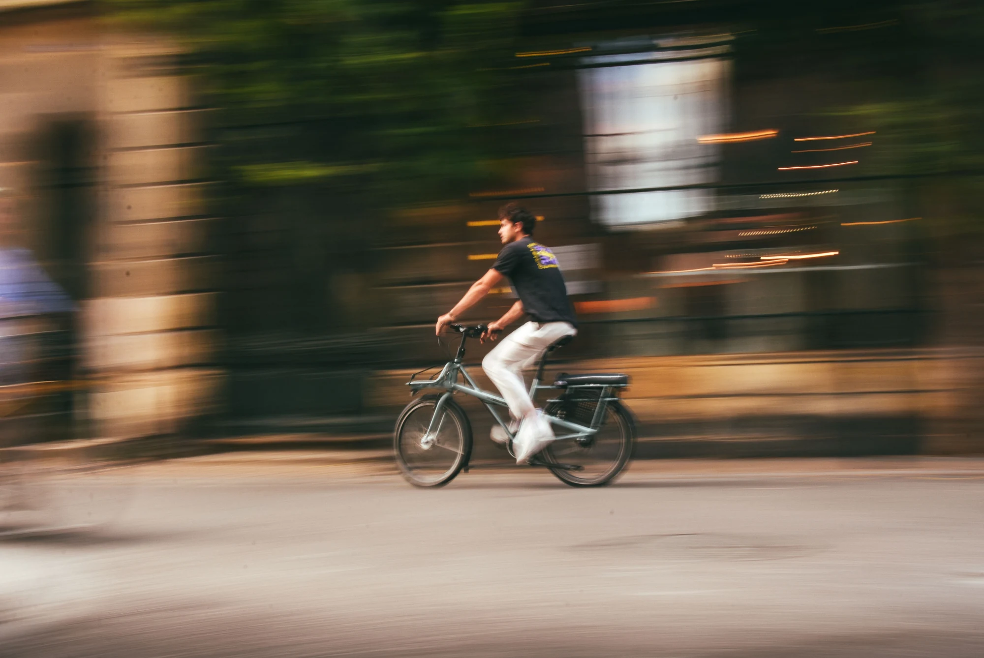 Cyclist riding through the Flagler Village neighborhood